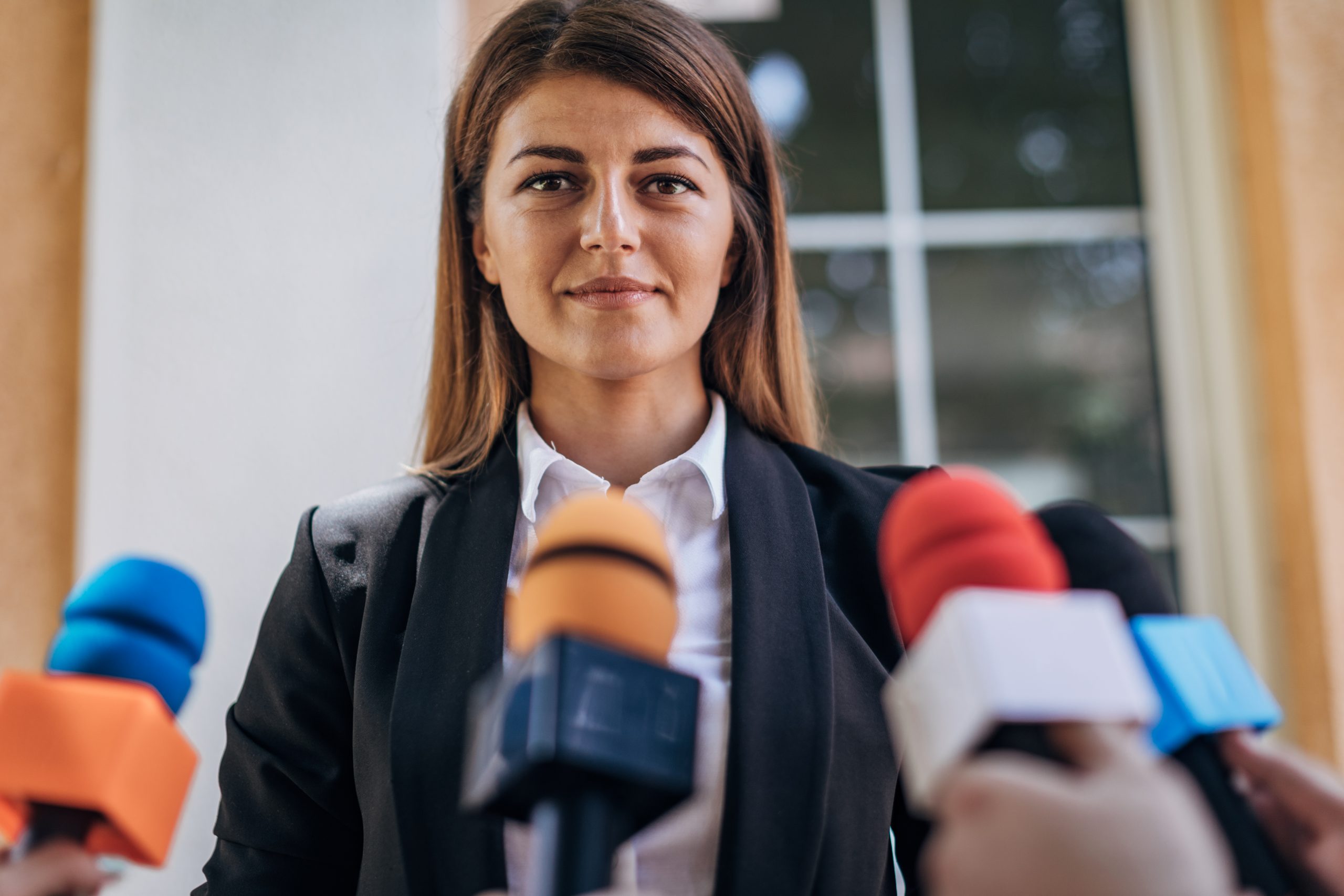 Politician speaking to reporters