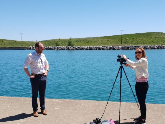 Filming in front of water