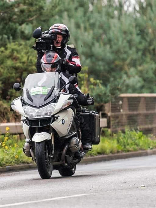 cameraman on motorcycle