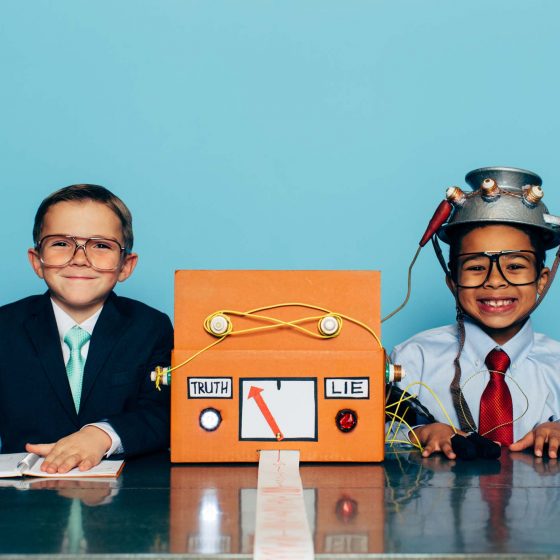 Children taking lie detector test. Test says child is telling the truth